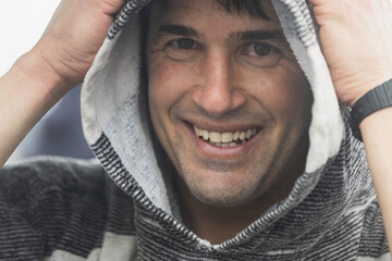 Joyful Surfer Drying Off with Towel After Surfing