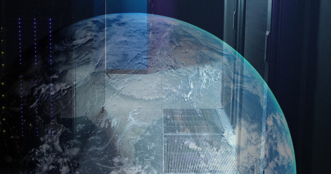 Image of a globe against computer server room