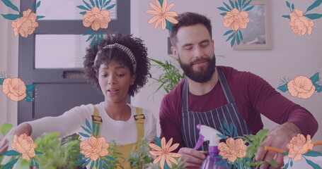 Image of flowers over happy diverse couple planting plants together