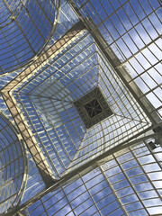 An interesting combination of glass and metal in Palacio de Cristal, originally a greenhouse, located in the de El Retiro Park in Madrid, Museu Nacional Centro de Arte Reina Sofia. Madrid, Spain.