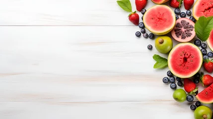 Poster Fresh berries, Summer background,Overhead view of colorful fruits, strawberries blueberries, mango orange, grapefruit, banana papaya apple, grapes, kiwis on the grey wood background, copy space  © zubair foods
