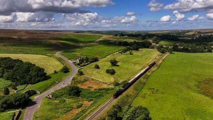 North York Moors Aerial View. North York Moors National Park in North Yorkshire, England. It was created by meltwater from a glacier carving the narrow valley.