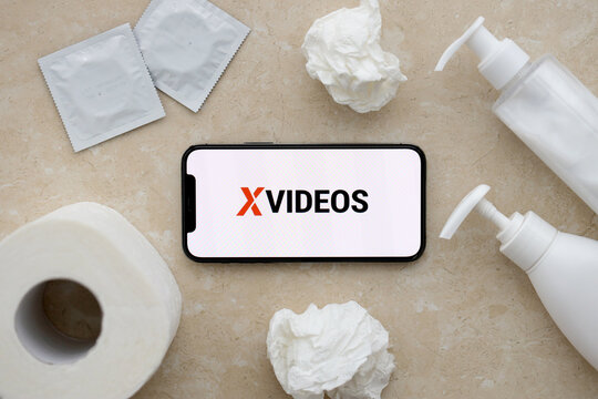 KYIV, UKRAINE - JANUARY 23, 2024 Xvideos adult content website logo on display of iPhone 12 Pro smartphone