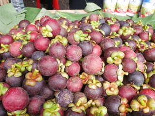 Various types of colorful fresh mangosteen It represents nature's abundance and healthy choices.