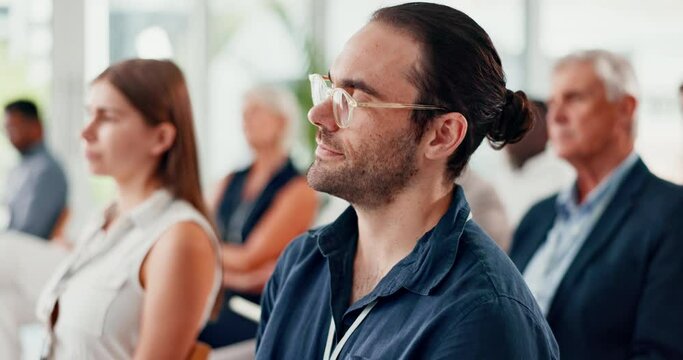 Business, seminar and man listening to training, information and learning at workshop. Professional, thinking and person with ideas from corporate trade show, convention or development from education