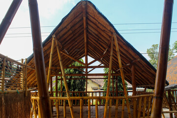 tree house building made of bamboo in a food stall	