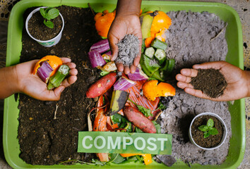 Children making composting