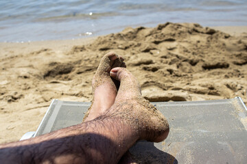 feet on the beach