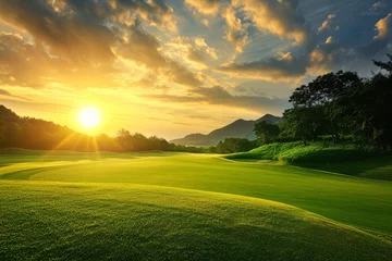 Gordijnen Golf course at sunset © STOCKAI
