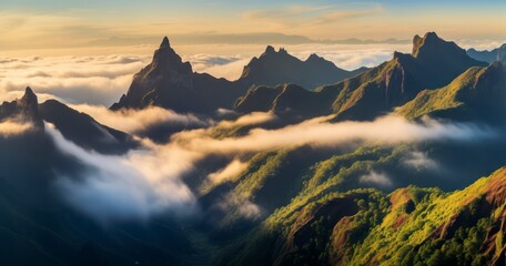 The Breathtaking Landscape of Mountains Rising Above Cloud Cover