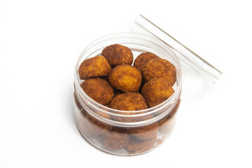 Palm cheese cookies in a jar isolated on white background clipping path