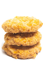 Stacked cornflakes cookies top view isolated on white background clipping path