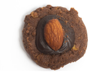Afghan cookies made from chocolate and cornflakes with almond on top view isolated on white background clipping path
