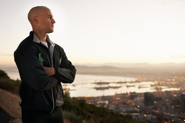 Man, thinking and fitness with city on mountain for sunrise, workout or outdoor exercise in nature....