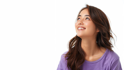 Asian woman wearing purple shirt smile looking up isolated on gray