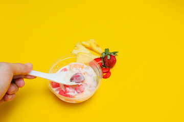 es buah or sup buah is indonesian fruit cocktail ice desert, contains strawberry, pineapple, and...