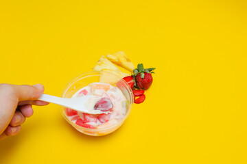 es buah or sup buah is indonesian fruit cocktail ice desert, contains strawberry, pineapple, and...