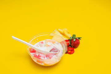 es buah or sup buah is indonesian fruit cocktail ice desert, contains strawberry, pineapple, and...