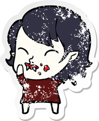 distressed sticker of a cartoon vampire girl with blood on cheek
