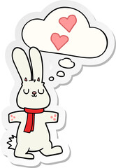 cartoon rabbit in love and thought bubble as a printed sticker