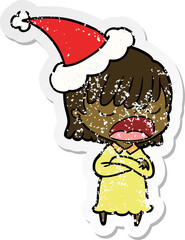 distressed sticker cartoon of a woman talking loudly wearing santa hat