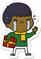 sticker of a cartoon man crying