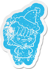 annoyed cartoon distressed sticker of a girl wearing santa hat