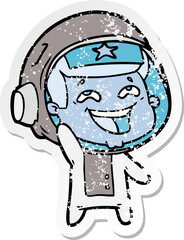 distressed sticker of a cartoon laughing astronaut