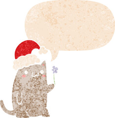 cute cartoon christmas cat and speech bubble in retro textured style