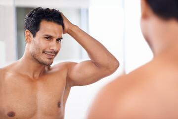 Body, bathroom mirror and happy man with hair check in house for skincare, wellness or morning routine. Hairline, reflection and male person with growth, texture or satisfaction after shower at home