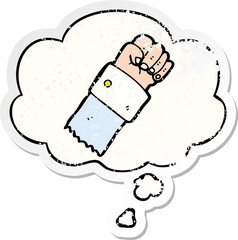 cartoon raised fist and thought bubble as a distressed worn sticker