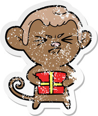 distressed sticker of a cartoon angry monkey