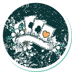 distressed sticker tattoo style icon of cards and banner