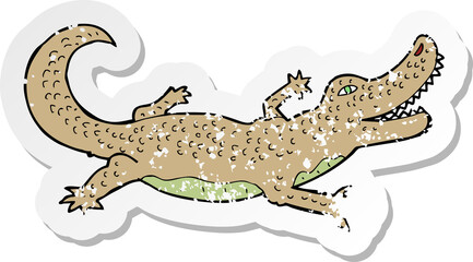 Fototapeta premium retro distressed sticker of a cartoon crocodile