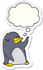 cartoon penguin and thought bubble as a printed sticker