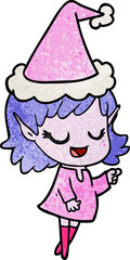 happy textured cartoon of a elf girl pointing wearing santa hat