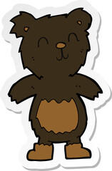 sticker of a cartoon teddy black bear