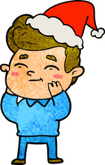 Fototapeta premium happy textured cartoon of a man wearing santa hat