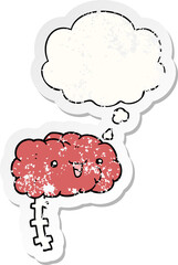 happy cartoon brain and thought bubble as a distressed worn sticker