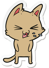 sticker of a cartoon cat hissing