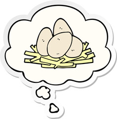 cartoon eggs in nest and thought bubble as a printed sticker