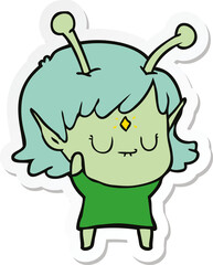 sticker of a cartoon alien girl