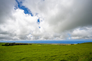Large mass of clouds over the coastline of Big Island Hawaii and the Pacific Ocean
