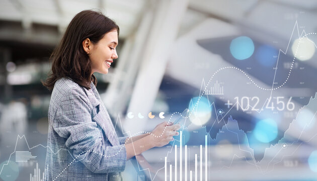 Side profile of a happy businesswoman using her smartphone in an airport lounge - Powered by Adobe