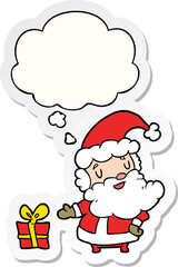 cartoon santa claus and thought bubble as a printed sticker