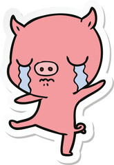 sticker of a cartoon pig crying