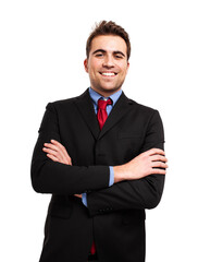 Cheerful young man in a suit with arms crossed on a white background