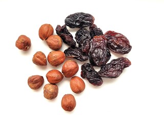 Hazelnuts and big raisins.