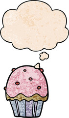 cartoon cupcake and thought bubble in grunge texture pattern style