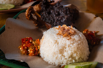 Spicy fried Duck, original food of Madura, Indonesia. also called Nasi Bebek Carok